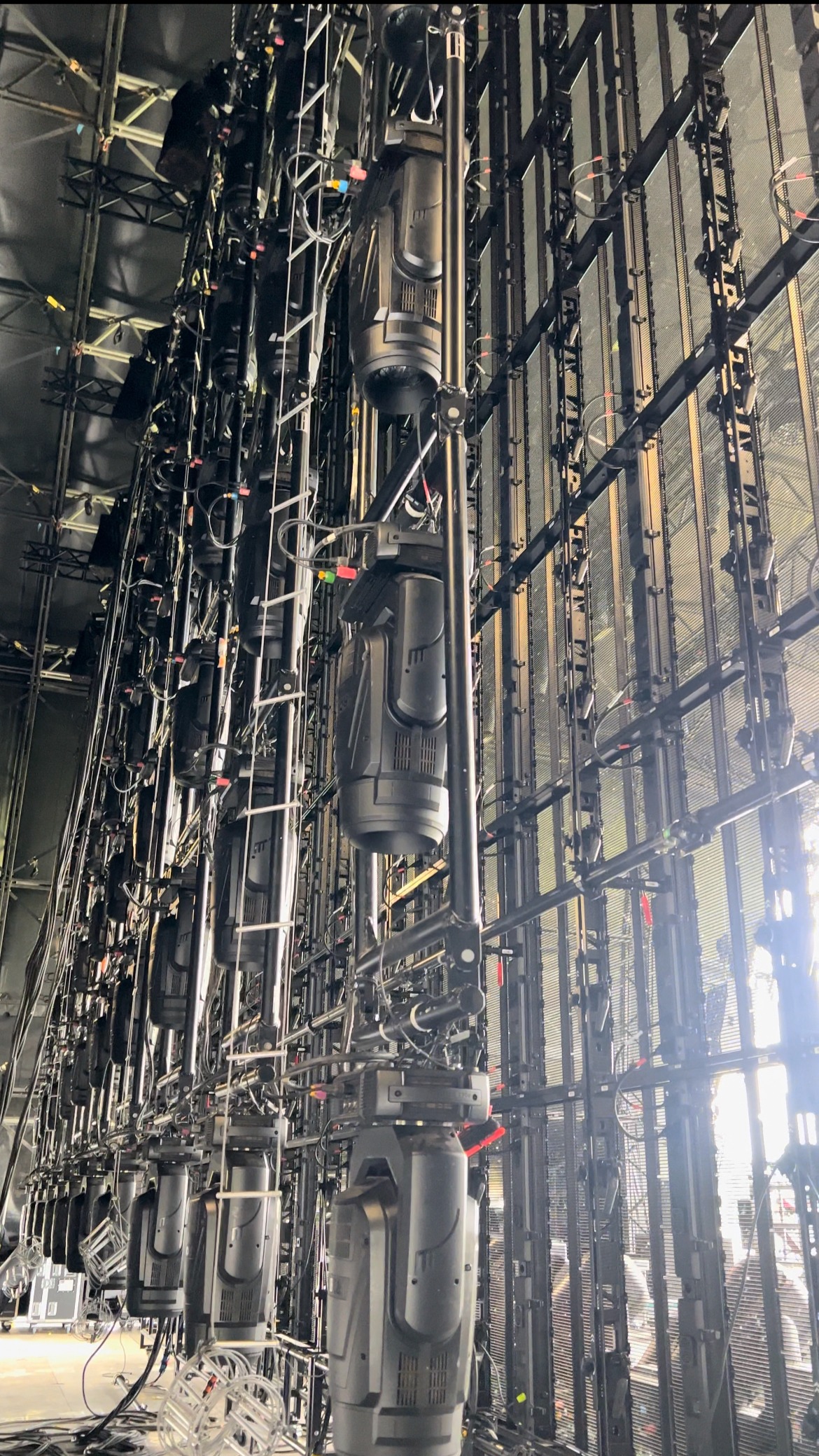 lighting fixtures on a truss on stage