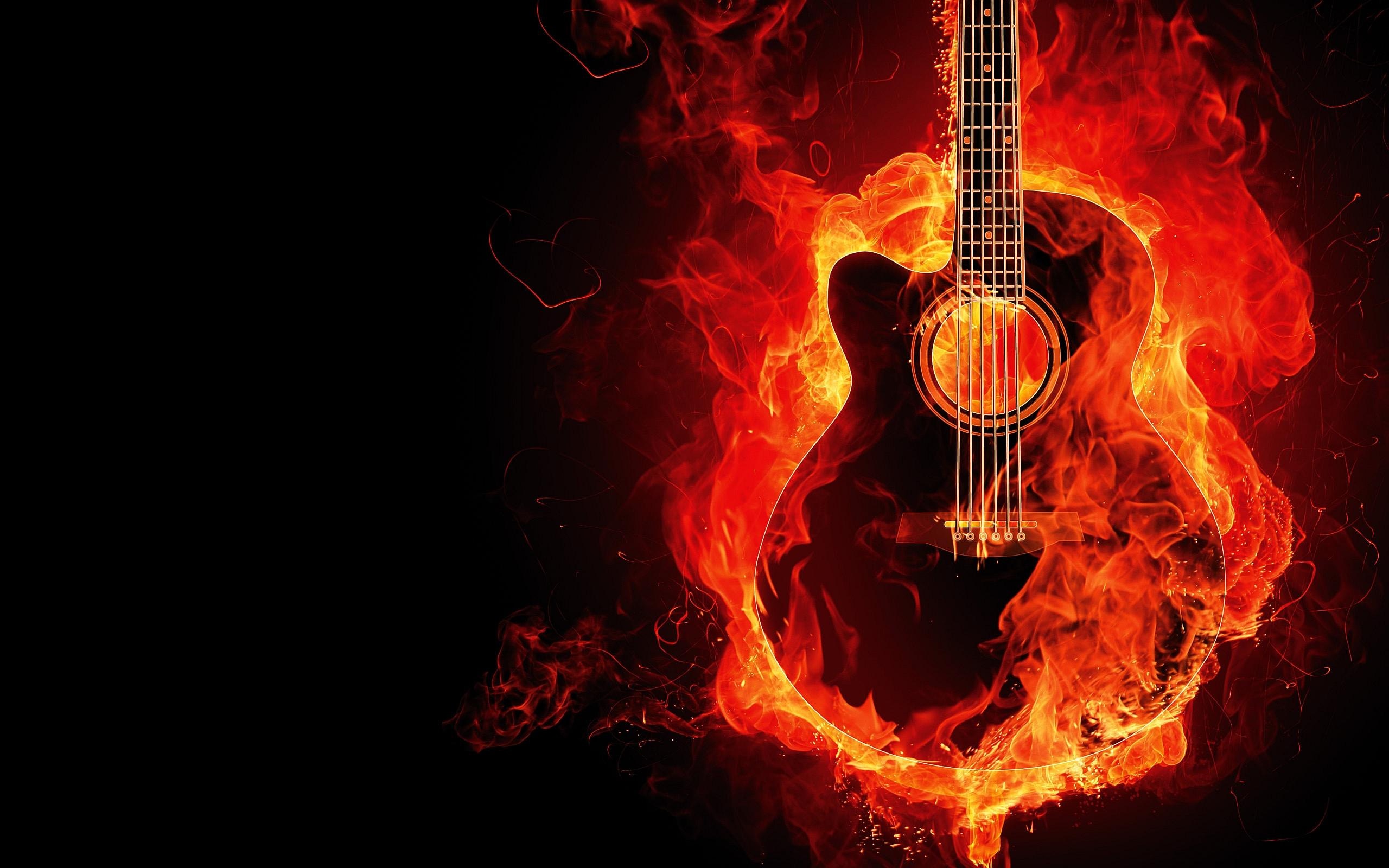 A guitar engulfed in vibrant flames against a black background, creating an intense and dynamic visual with striking reds and oranges.